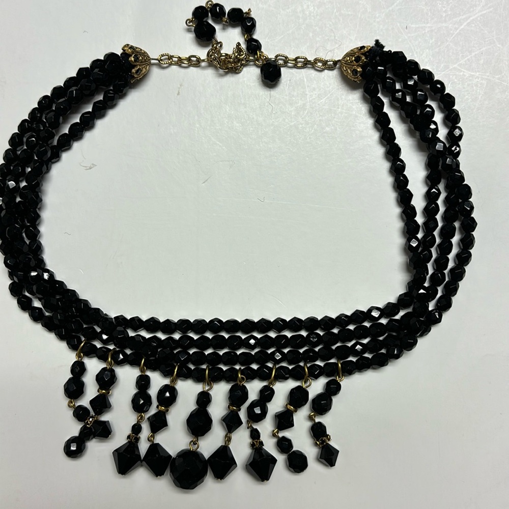 Black necklace four rows of black beads